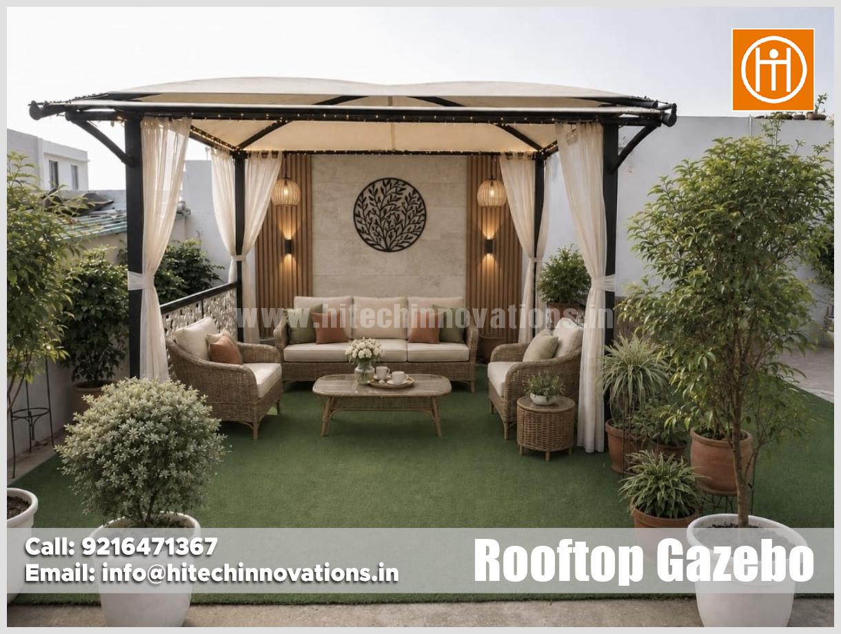 Rooftop gazebo installed in Panchkula, Haryana, featuring artificial turf, potted plants, and modern outdoor seating furniture.