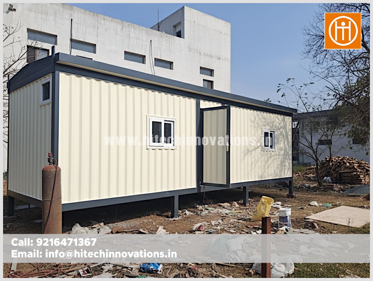 Self-sufficient luxury container home in Himachal Pradesh by Hitech Innovations Mohali featuring cream corrugated walls and grey trim.