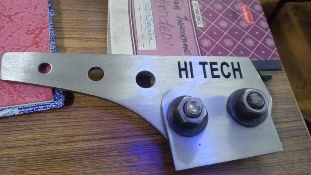 A high-precision Hitech Innovations angular tensile tester component, custom-fabricated from heavy-duty stainless steel with industrial-grade bolt fastenings for structural load testing.