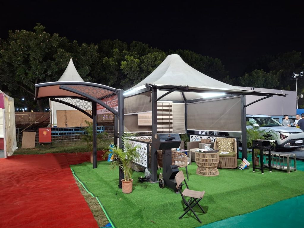 Hitech Innovations exhibit at the CII Trade Fair in Chandigarh, showcasing a designer tensile gazebo, modern car shed, and premium outdoor canteen furniture.
