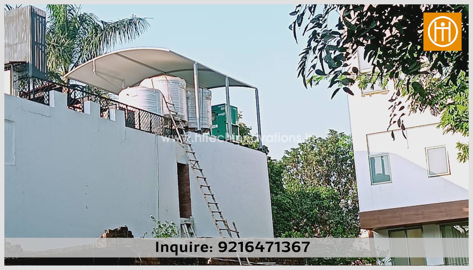 A street-level perspective showing a large tensile canopy installed by Hitech Innovations on a rooftop, protecting equipment from the sun with a sleek, weather-resistant fabric membrane.