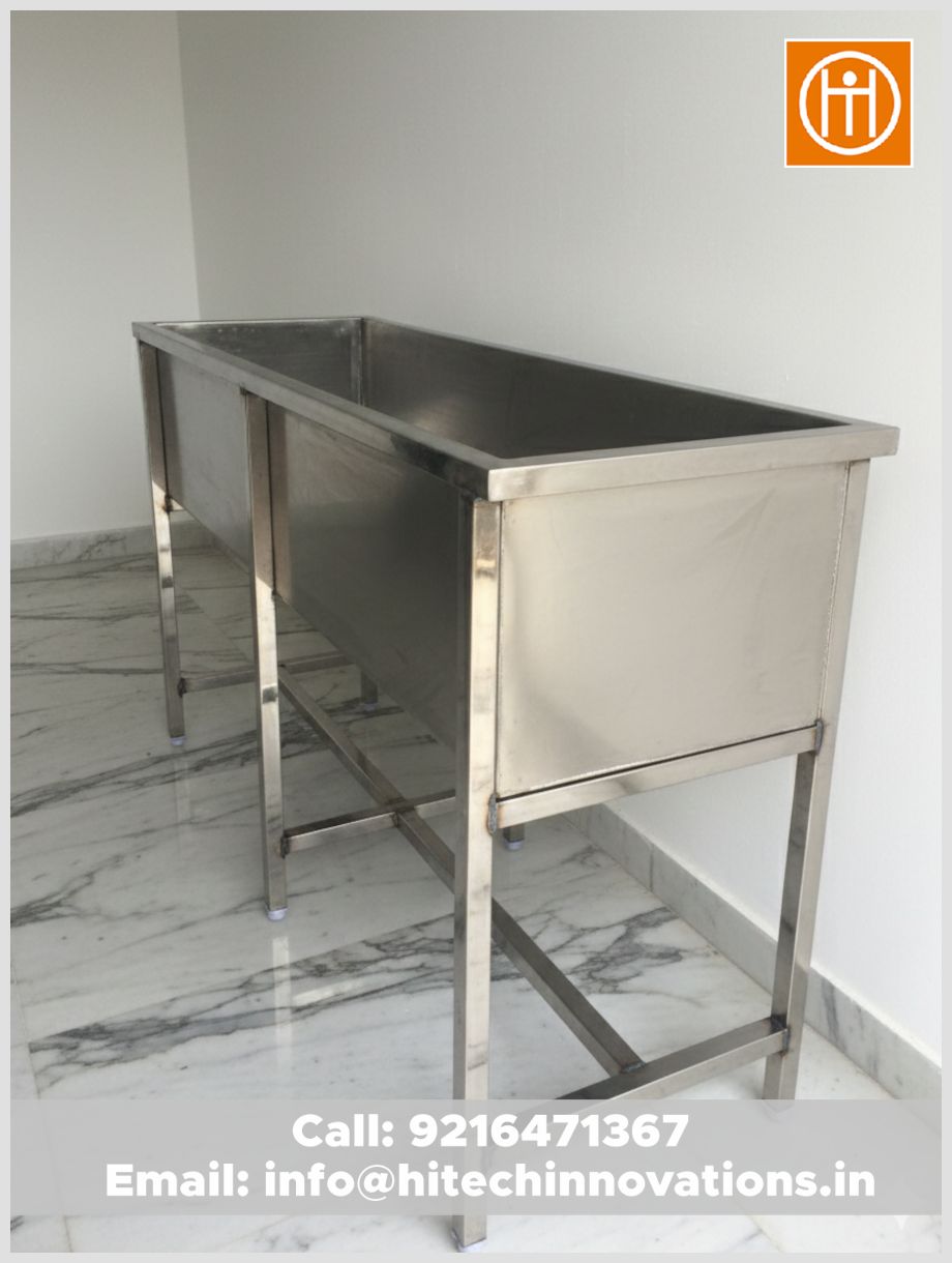 Industrial-grade stainless steel deep-trough commercial kitchen sink by Hitech Innovations, featuring a sturdy rectangular frame and reinforced legs for heavy-duty use.