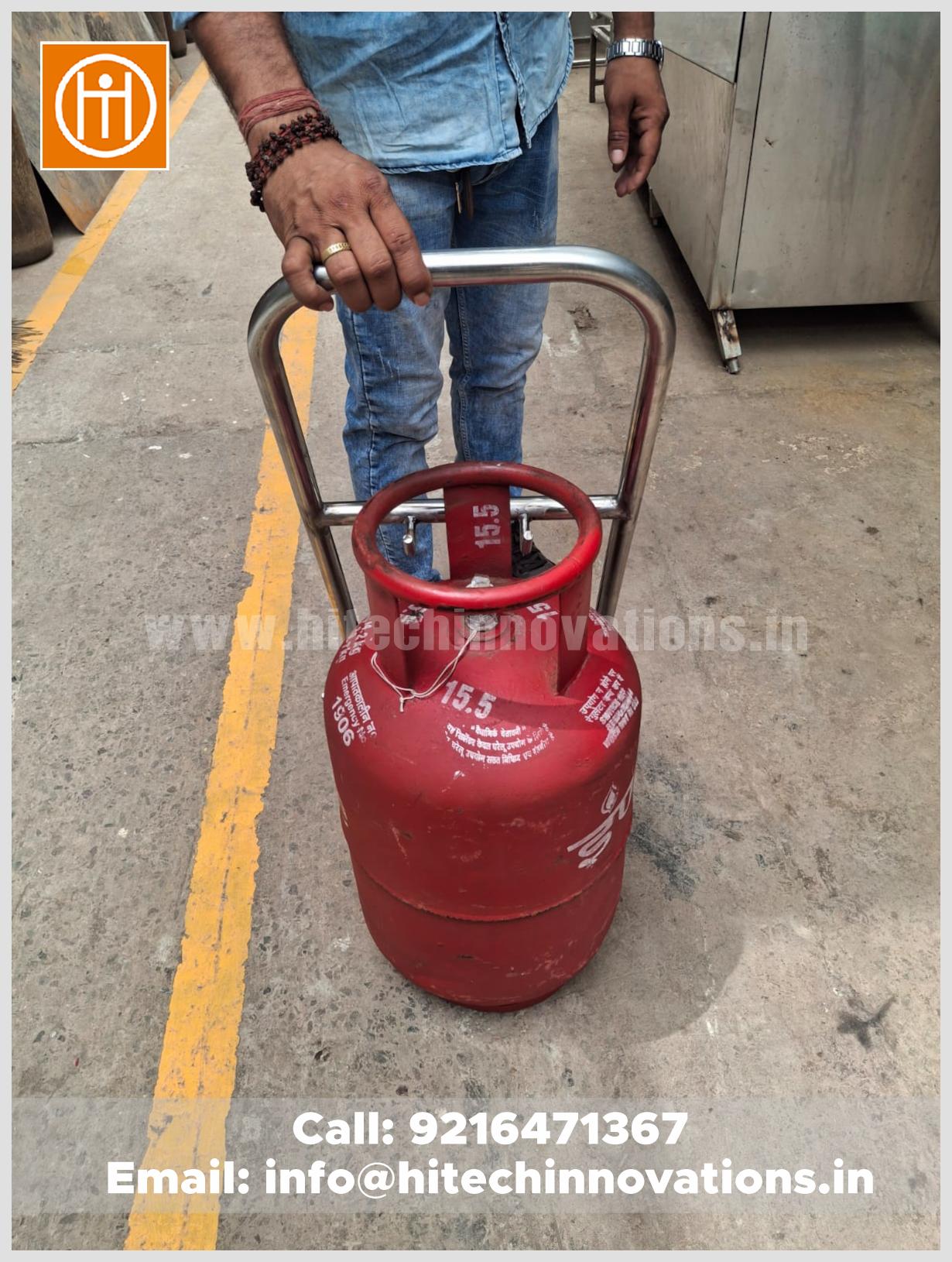Industrial grade gas cylinder trolley with 50kg weight capacity showing secure handle grip for easy management