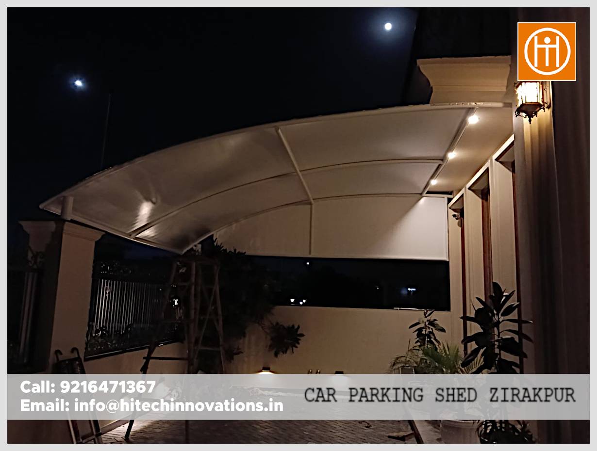 Under-side detail of tensile car parking shed membrane and steel frame