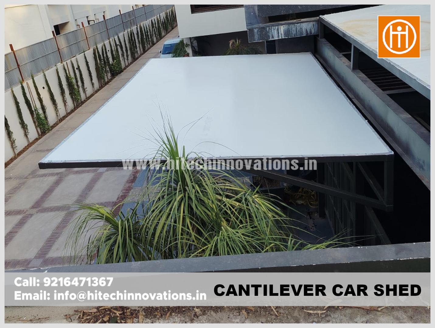 Top-down view of a sturdy, flat-roofed cantilever car shed designed for maximum weather protection.