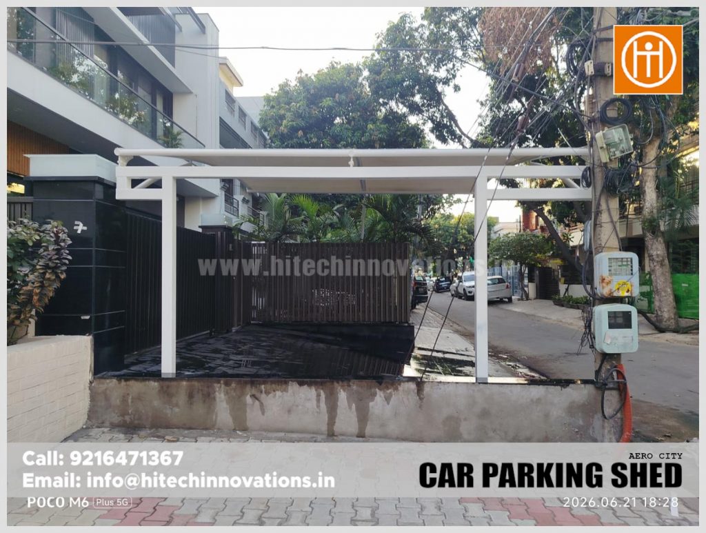 Side view of the durable tensile car parking shed installation in AERO City, Mohali.