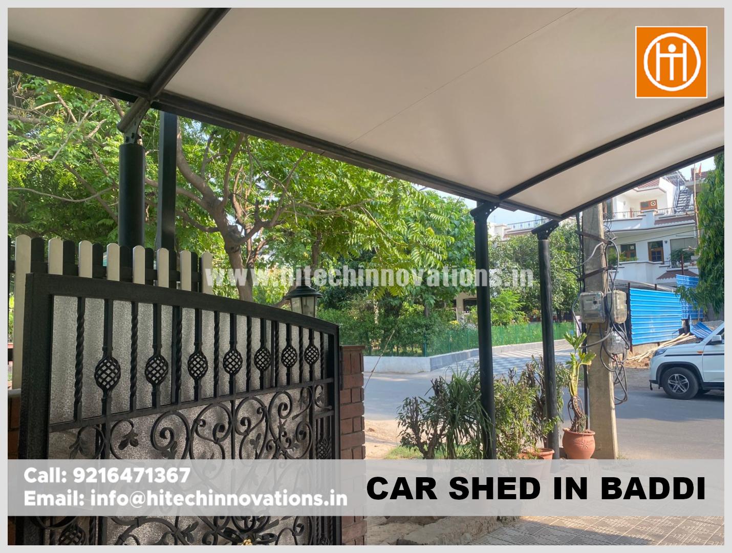 Side view of a premium tensile car parking shed featuring a sleek arch design manufactured by ISO 9001:2015 certified Hitech Innovations.