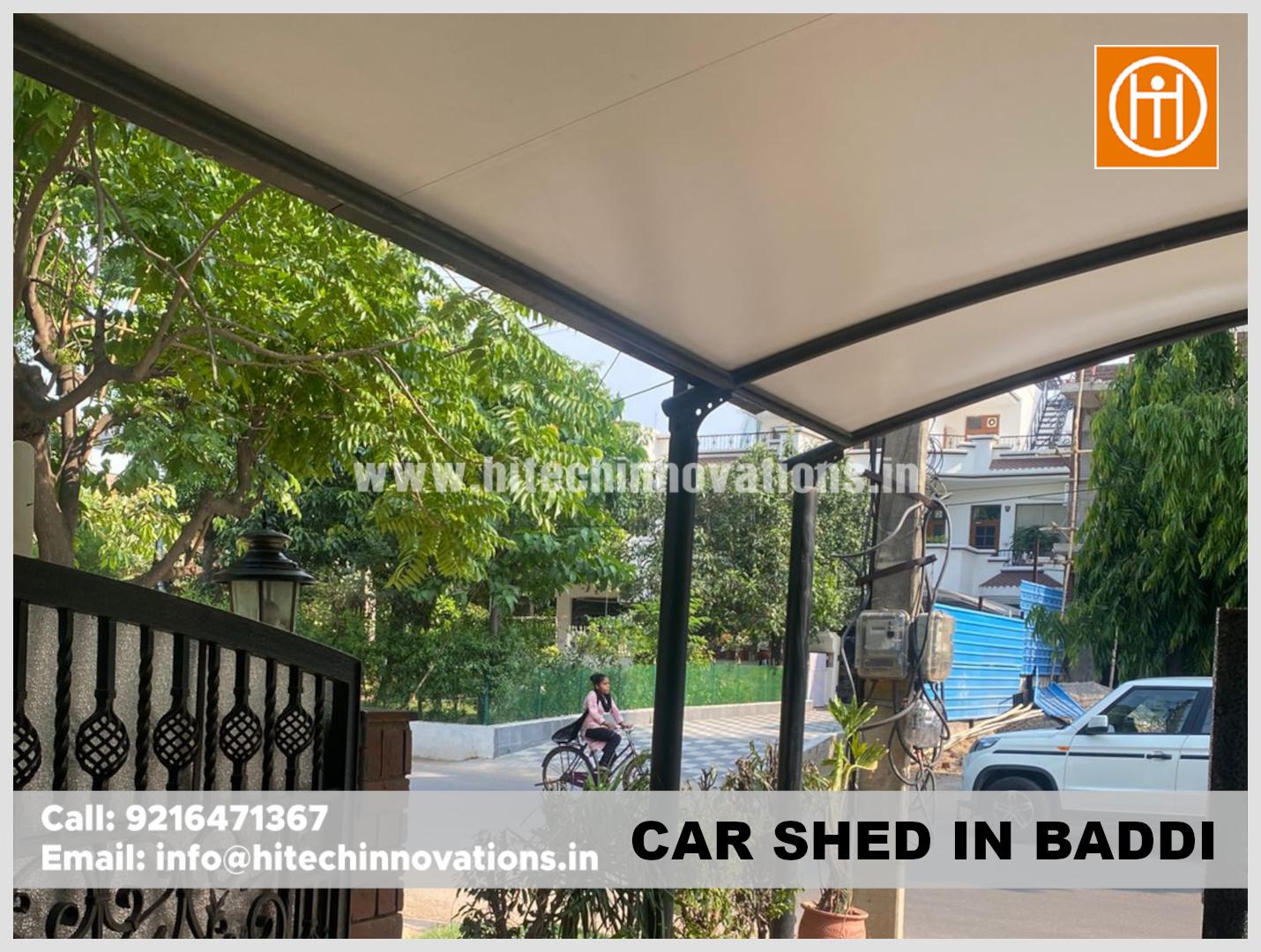 Residential tensile car shed in Baddi, Himachal Pradesh, combining robust MS pipe construction with high-quality weather-resistant fabric.