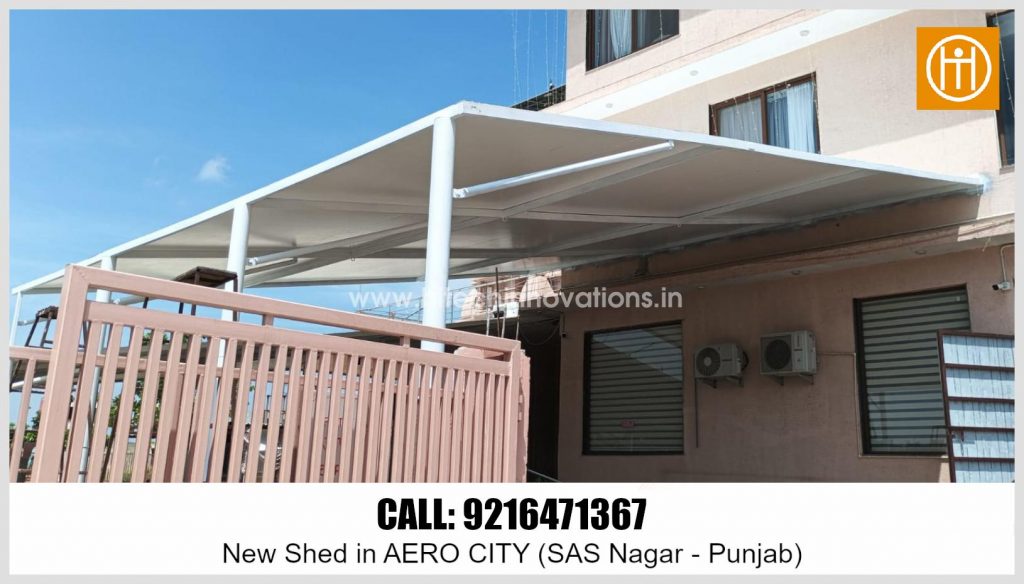 Hitech Innovations ISO 9001:2015 new shed installation in Aero City, SAS Nagar, Punjab showing white structural framing and roofing with contact number 9216471367