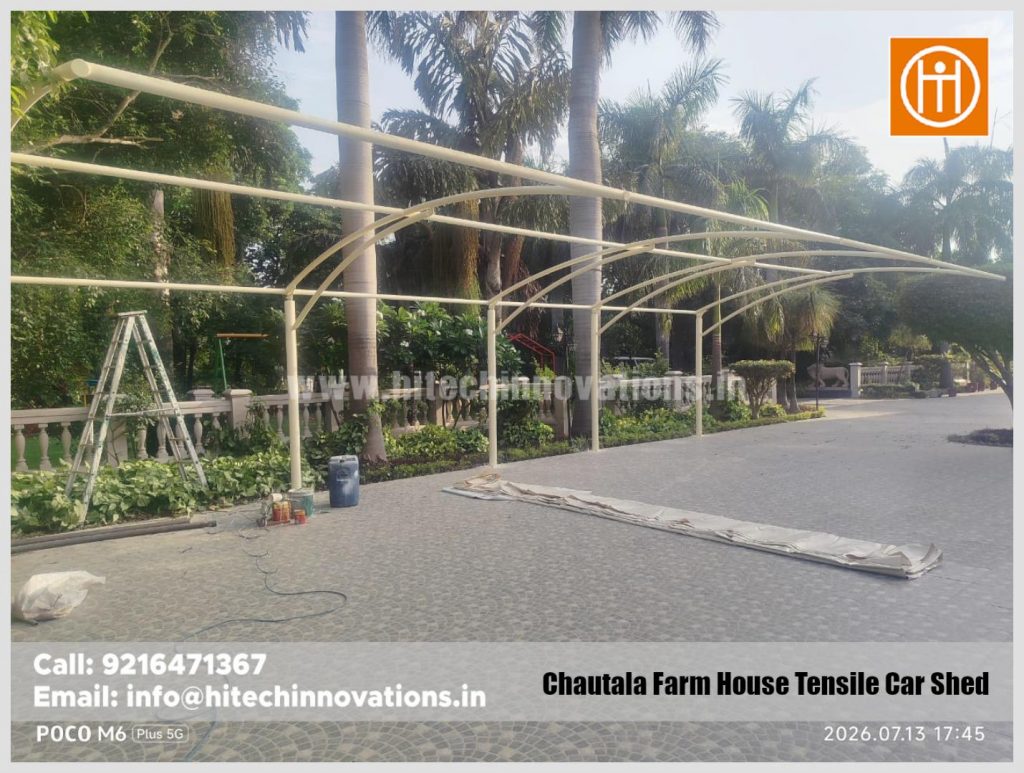 Installation process of a tensile car parking shed at a farmhouse in Chautala, Haryana by Hitech Innovations.
