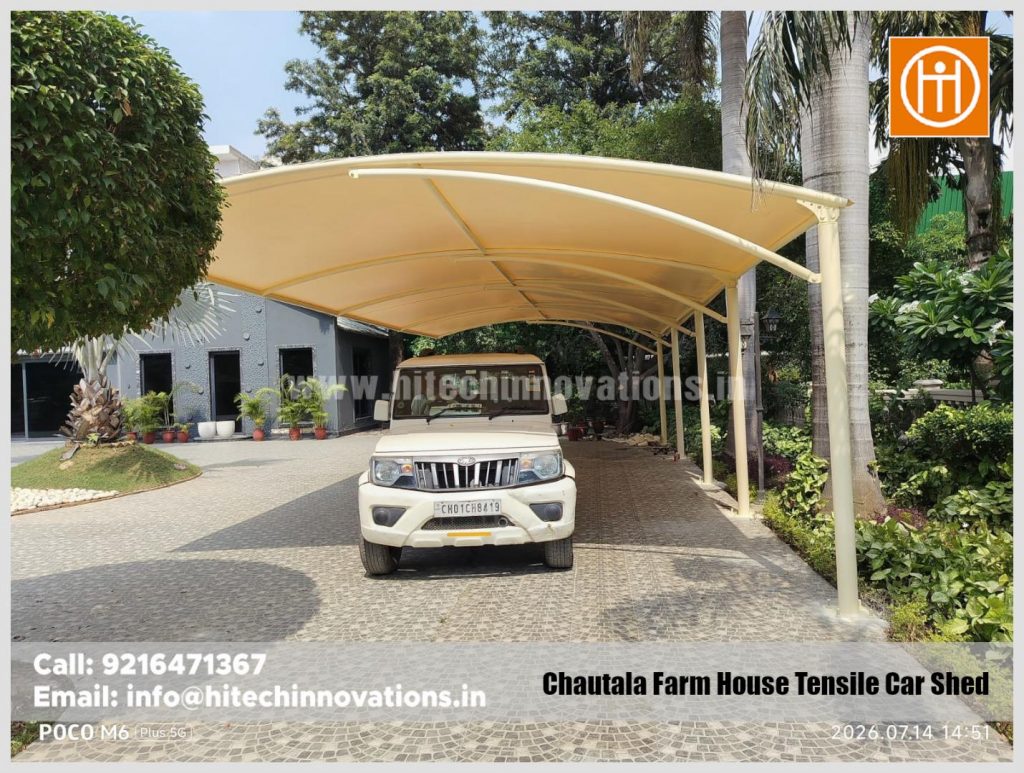 Front view of a SUV parked under the completed premium tensile car shed in Haryana.