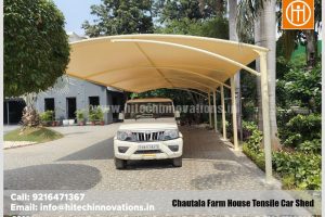 Front view of a SUV parked under the completed premium tensile car shed in Haryana.