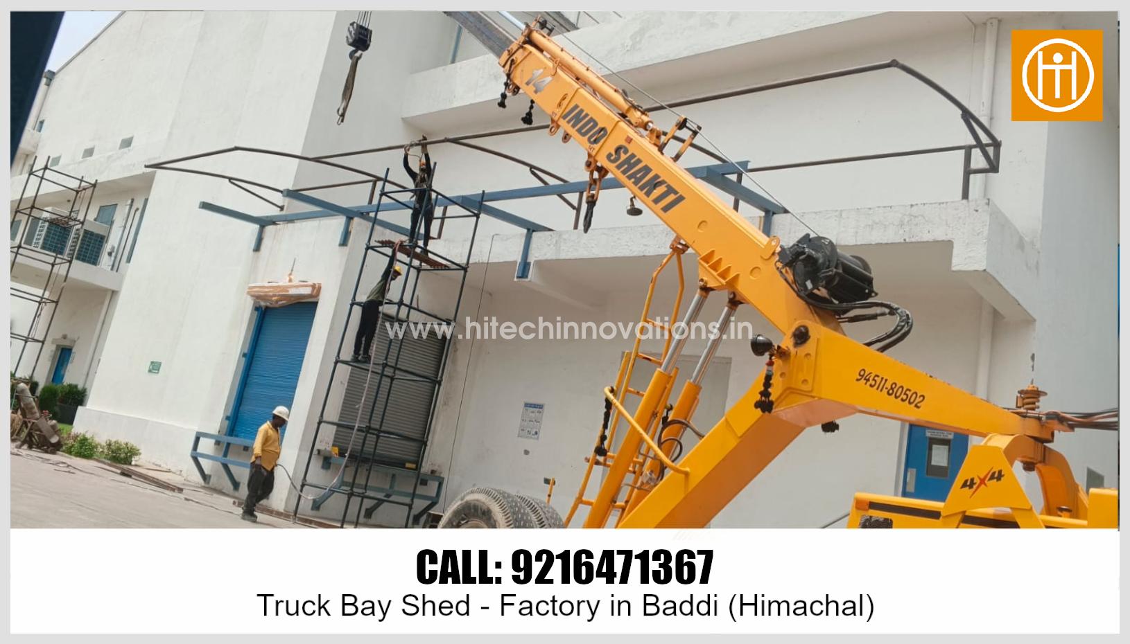 Installation process using a crane to erect trusses for the industrial tensile shed by Hitech Innovations