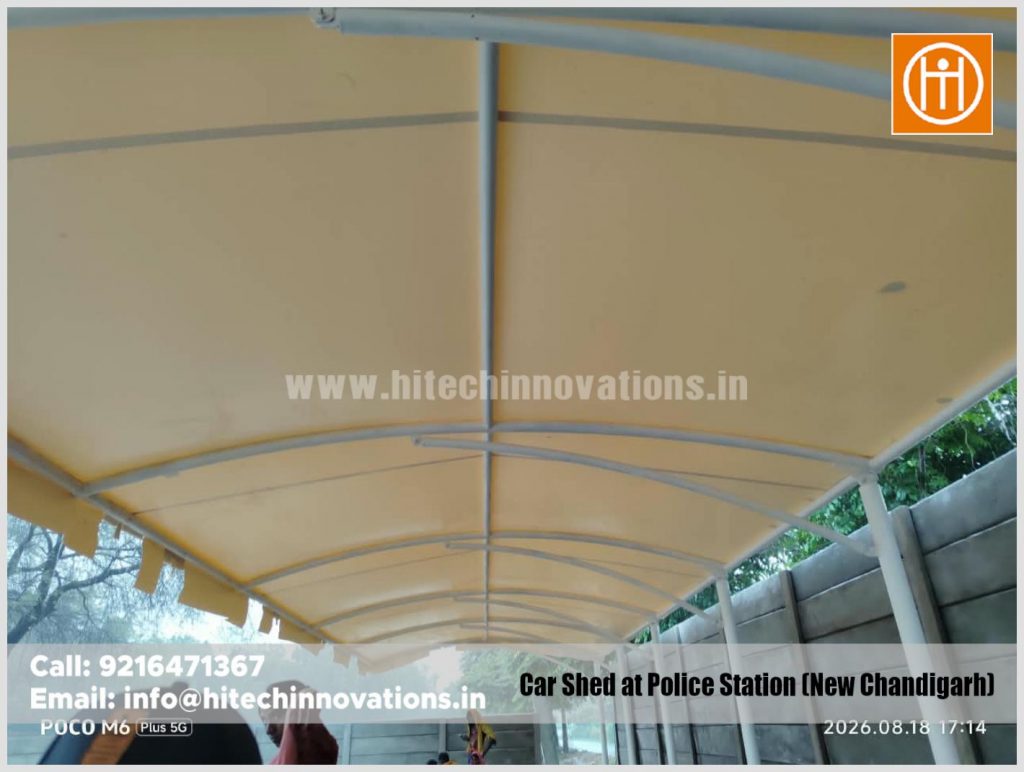 Interior ceiling perspective of the durable, tensioned fabric roof providing robust vehicle protection.