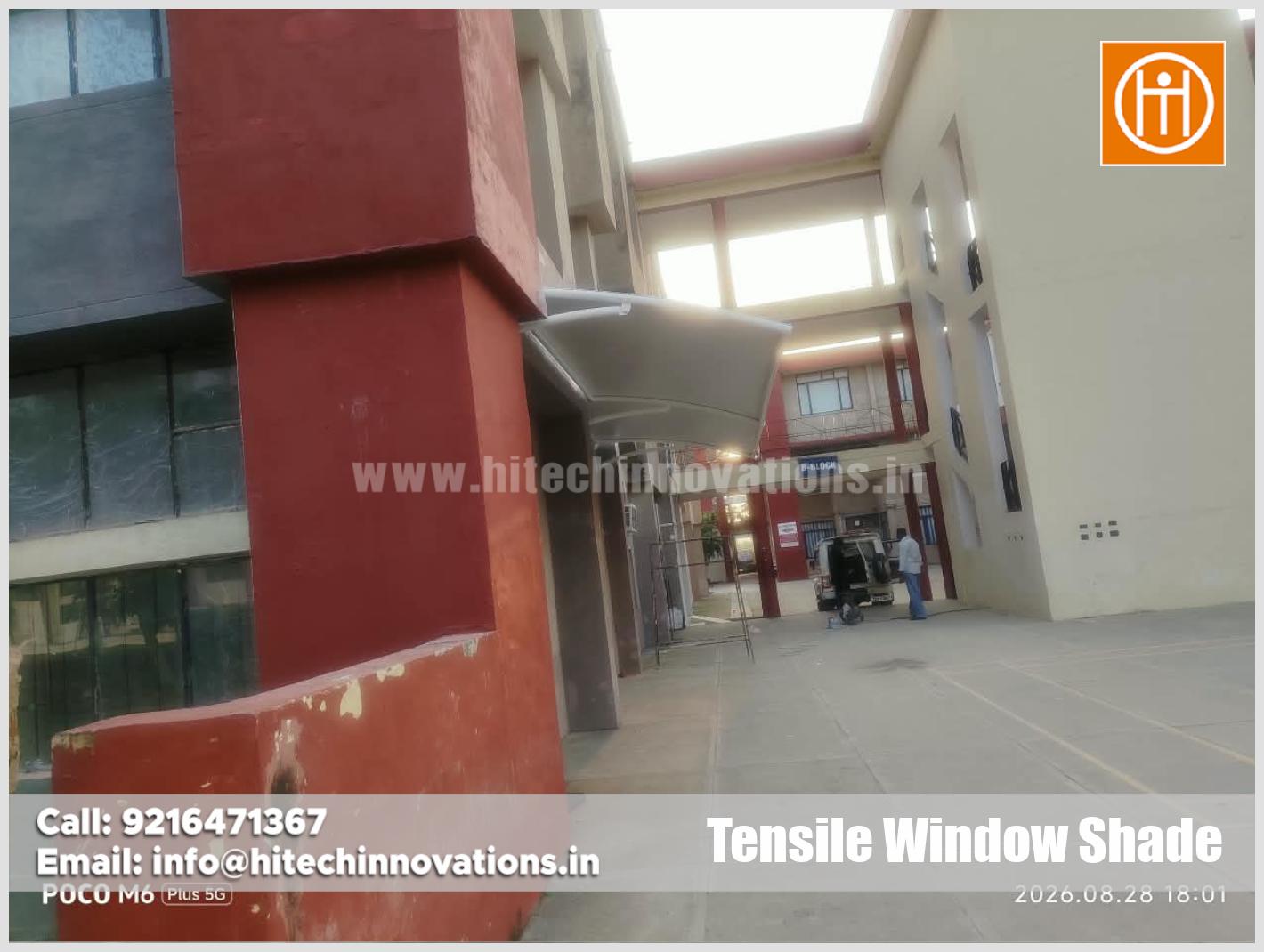 Durable wide span tensile window canopy providing weather and sun protection at Lamrin Tech Skills University