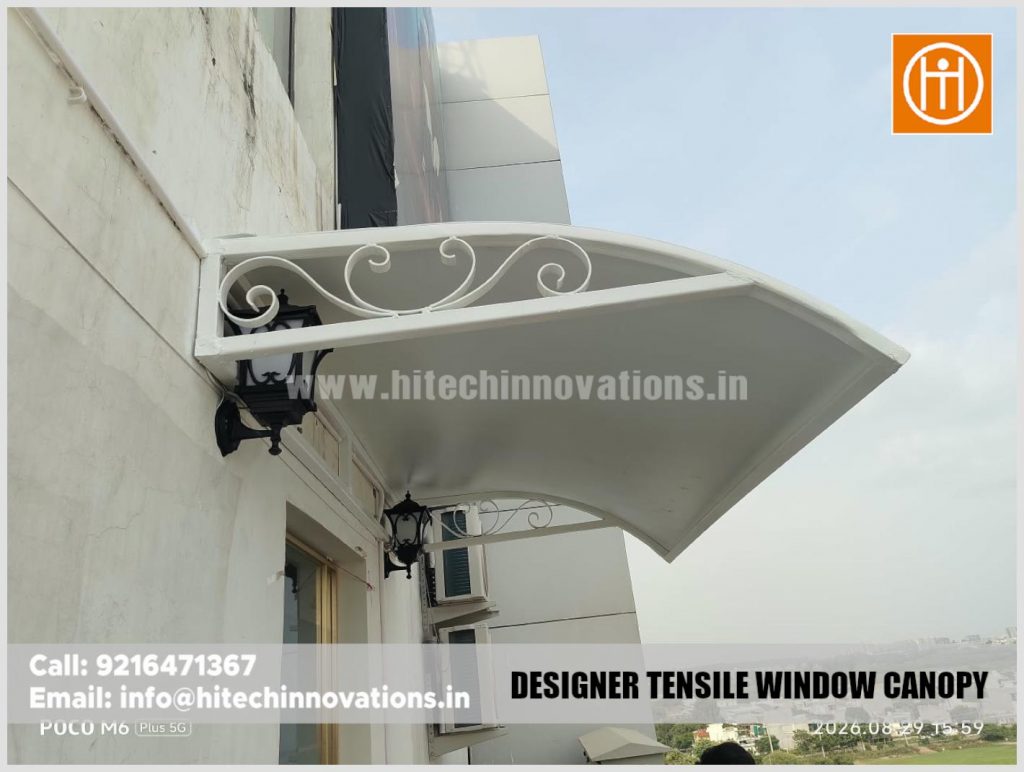 Close up view of the curved framework and white membrane of a designer tensile window canopy in Mohali