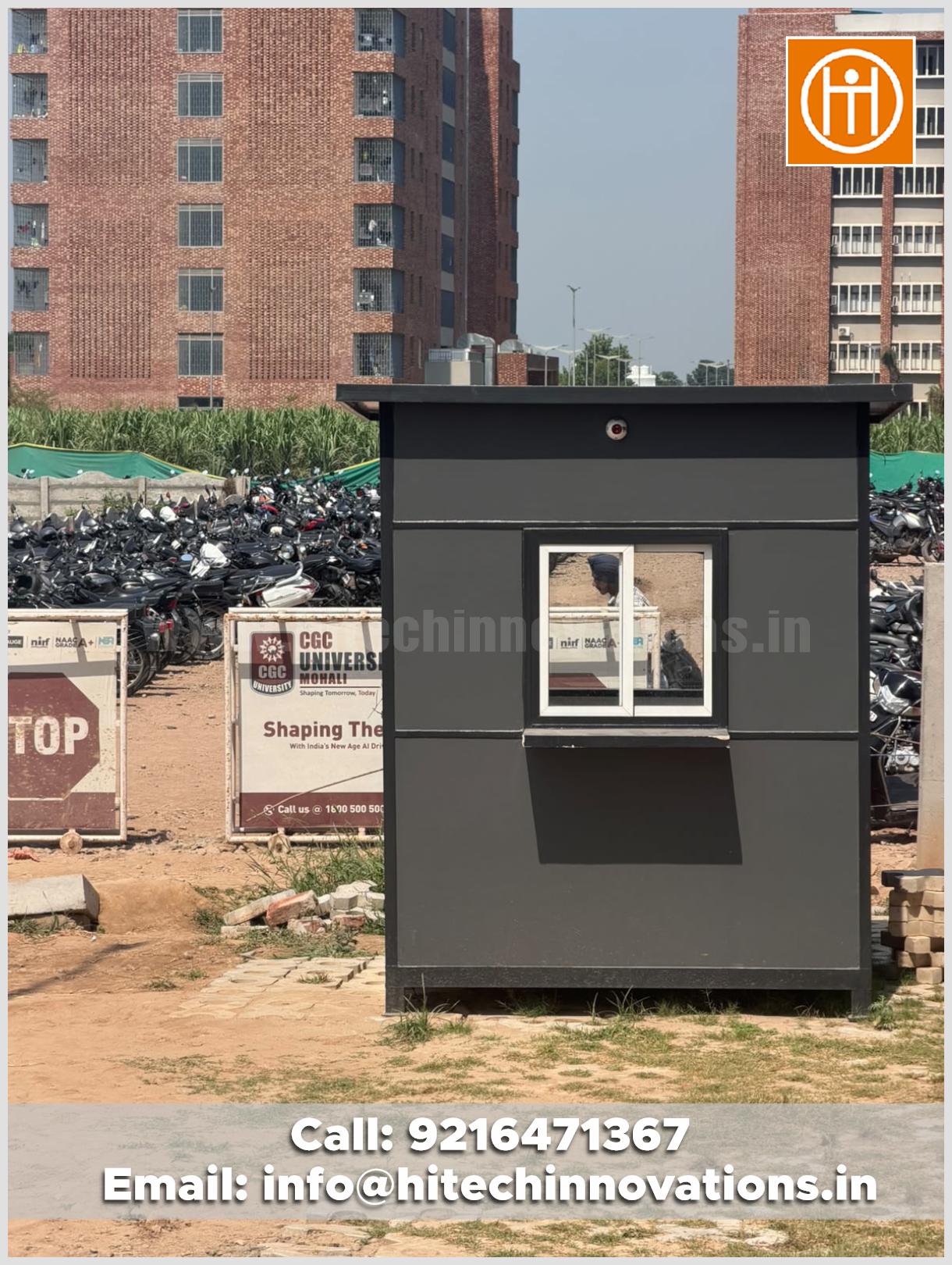 Guard Room manufactured by Hitech Innovations installed on the campus of CGC University, Mohali, featuring a modern grey cabin with a sliding window.